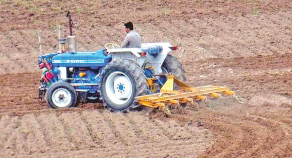 tractor plowing field Pakistan